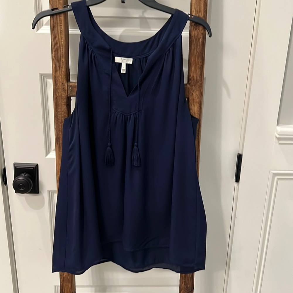 Silly navy blue top with faux tie at top.